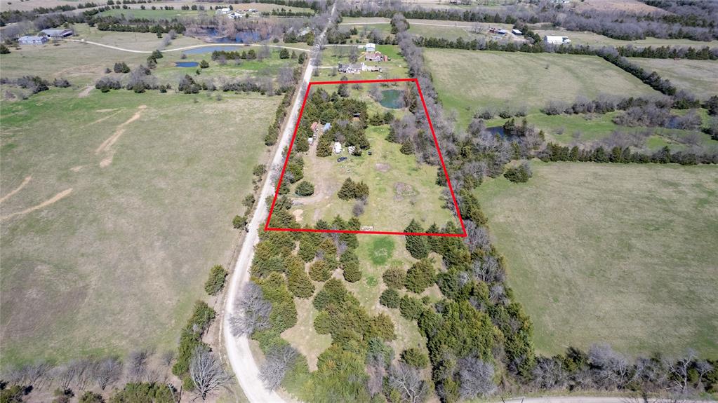 645 County Road 4160 Bonham, TX 75418 - Photo 29 of 37 Birds eye view of property featuring a rural view