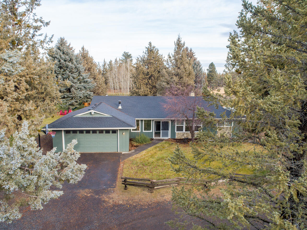 63410 Hamehook Road Bend, OR 97701 - Photo 3 of 35 a view of a house with a yard