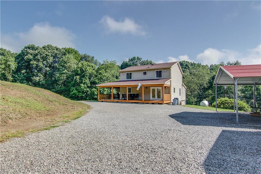 1053 Baileys Run Road Tarentum, PA 15084 - Photo 3 of 25 Parking will never be an issue, enjoy a wrap around driveway. Garage and carport