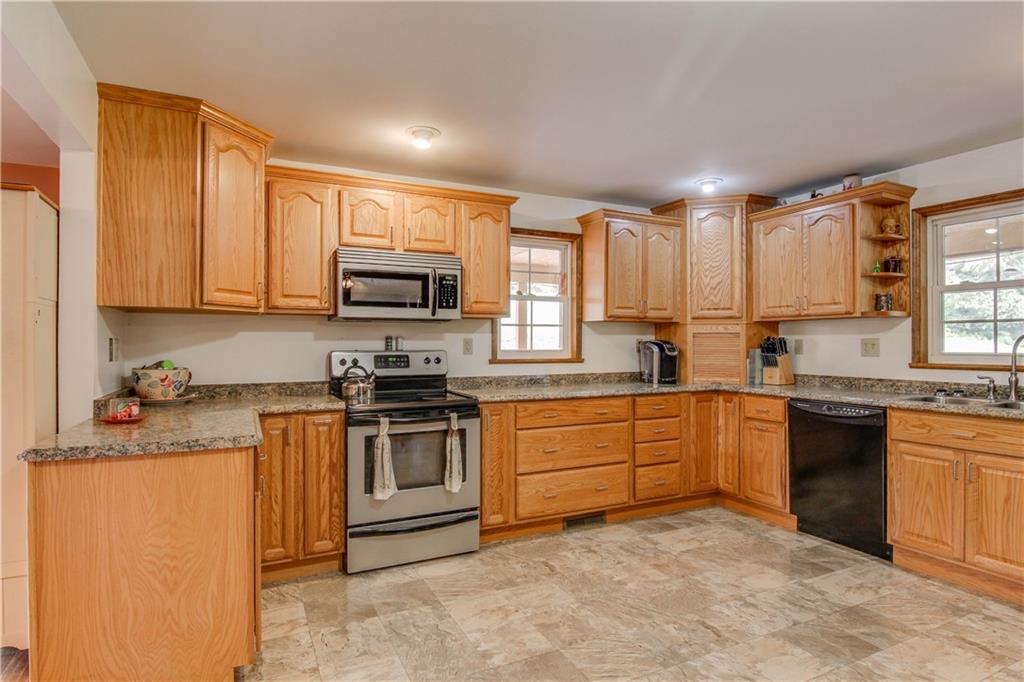 1053 Baileys Run Road Tarentum, PA 15084 - Photo 9 of 25 Beautiful wood cabinetry with stainless steel appliances. Ample cabinet and pantry space