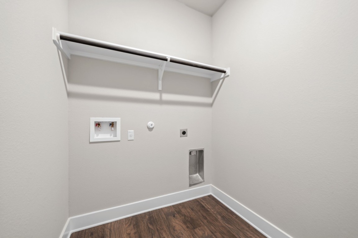 217 Pinnacle Lane Kyle, TX 78640 - Photo 20 of 33 a view of small space with racks on the wall