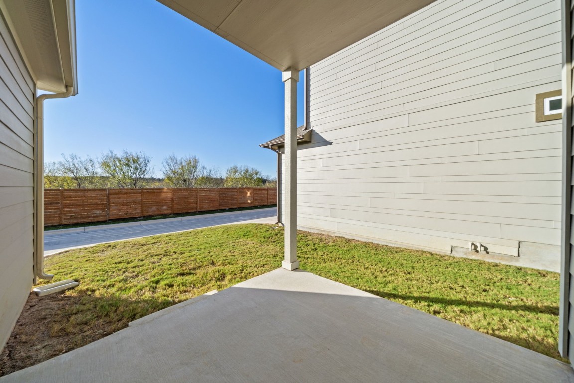 217 Pinnacle Lane Kyle, TX 78640 - Photo 31 of 33 a view of a yard with an outdoor seating