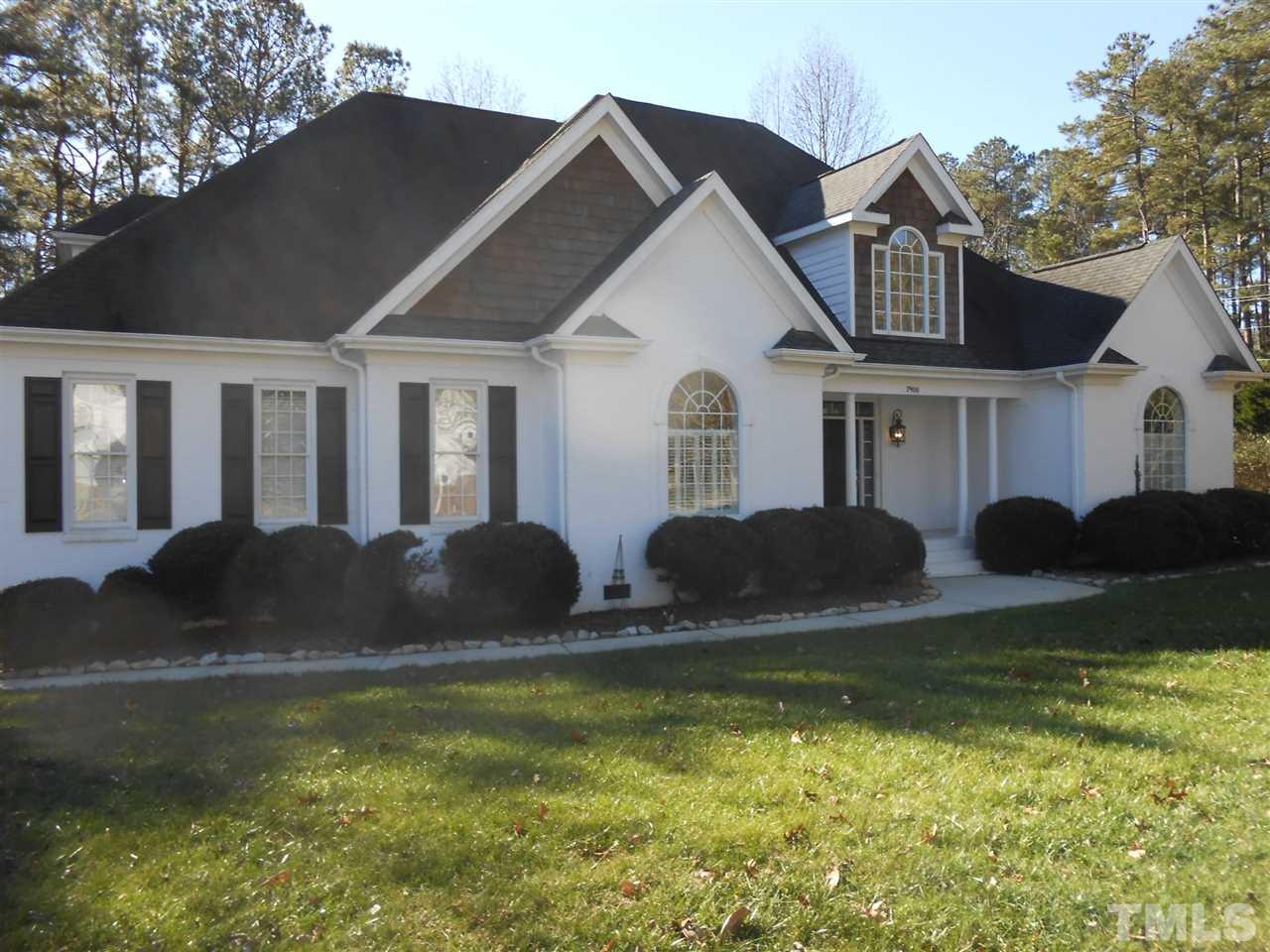 7900 Oneal Road Raleigh, NC 27613 - Photo 1 of 25 a front view of house with yard and trees in the background