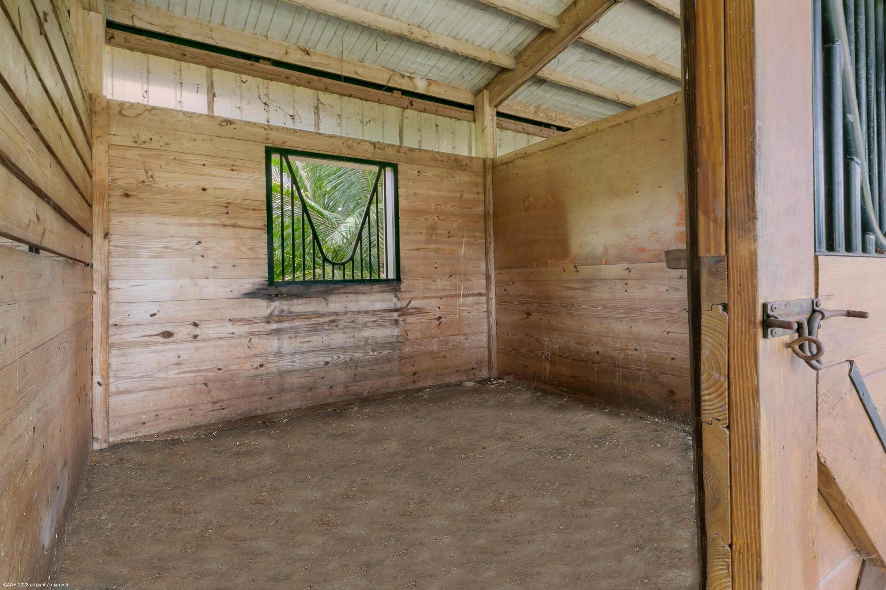 16559 Rustic Road Wellington, FL 33470 - Photo 22 of 82 a view of a door