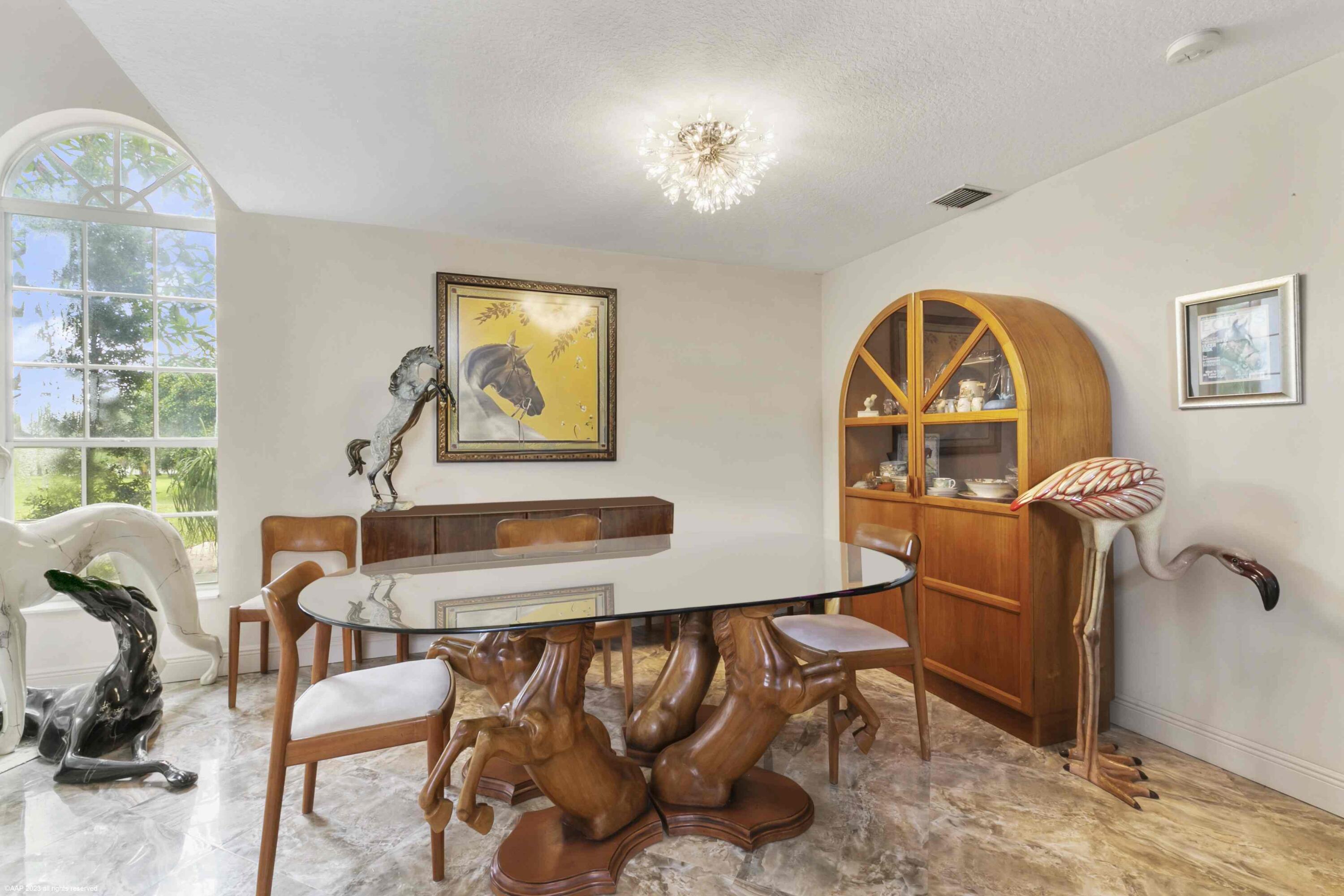 16559 Rustic Road Wellington, FL 33470 - Photo 46 of 82 a living room with furniture and a window