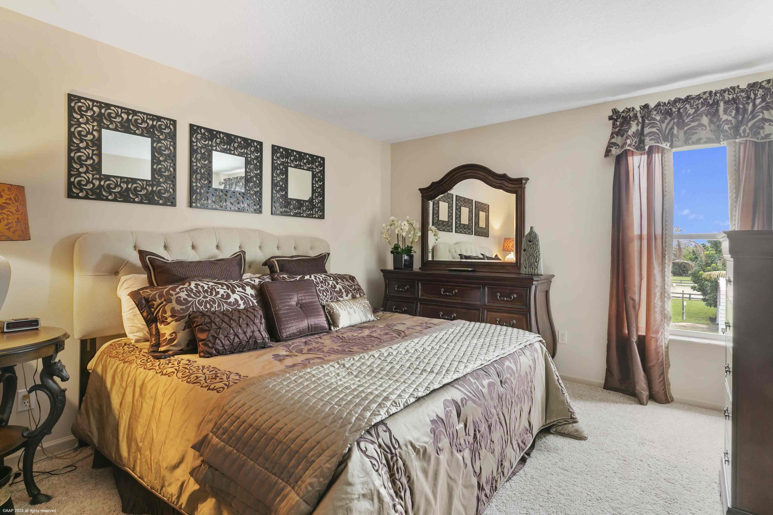 16559 Rustic Road Wellington, FL 33470 - Photo 68 of 82 a bedroom with a bed and a view of bathroom
