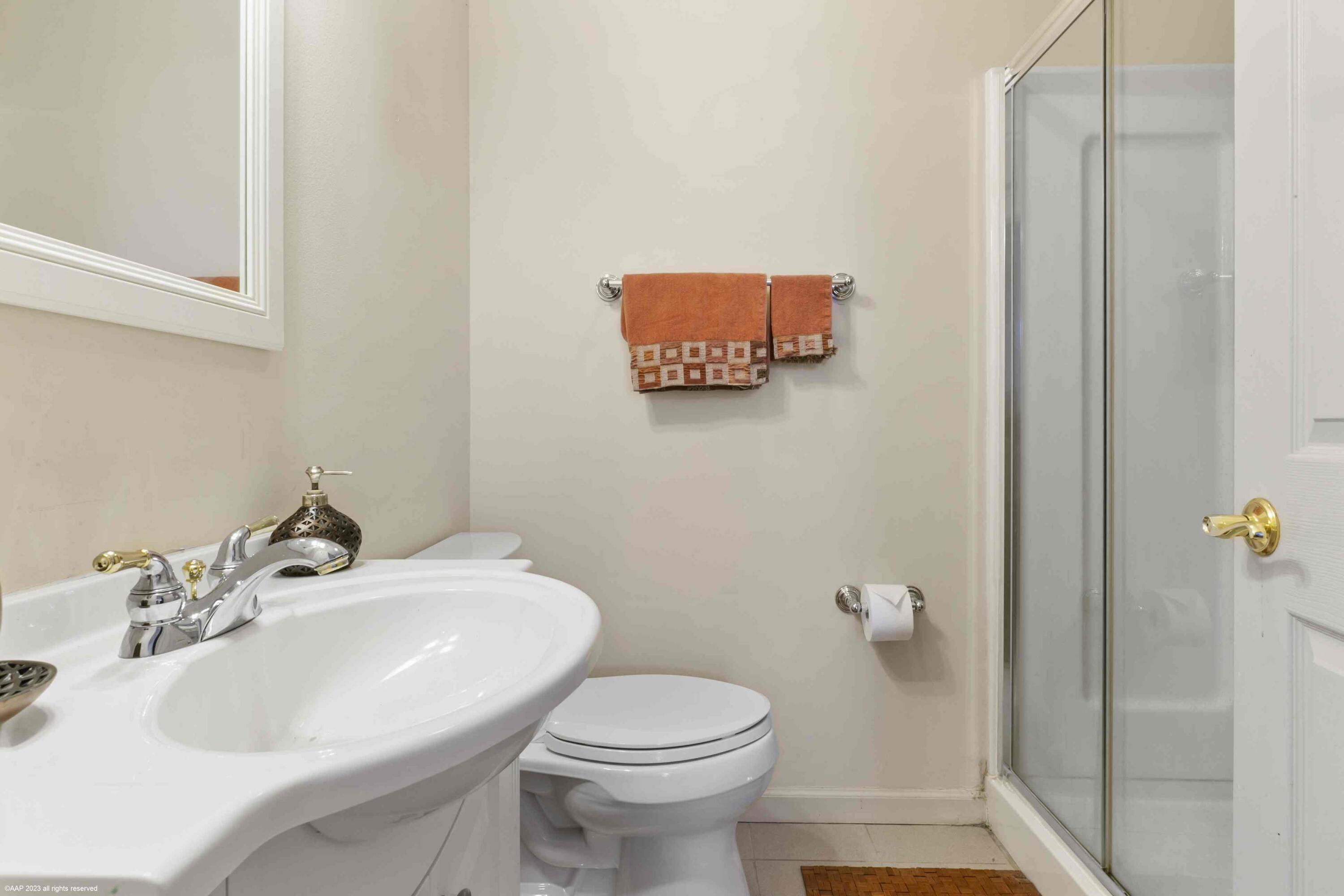 16559 Rustic Road Wellington, FL 33470 - Photo 69 of 82 a bathroom with a sink and a toilet