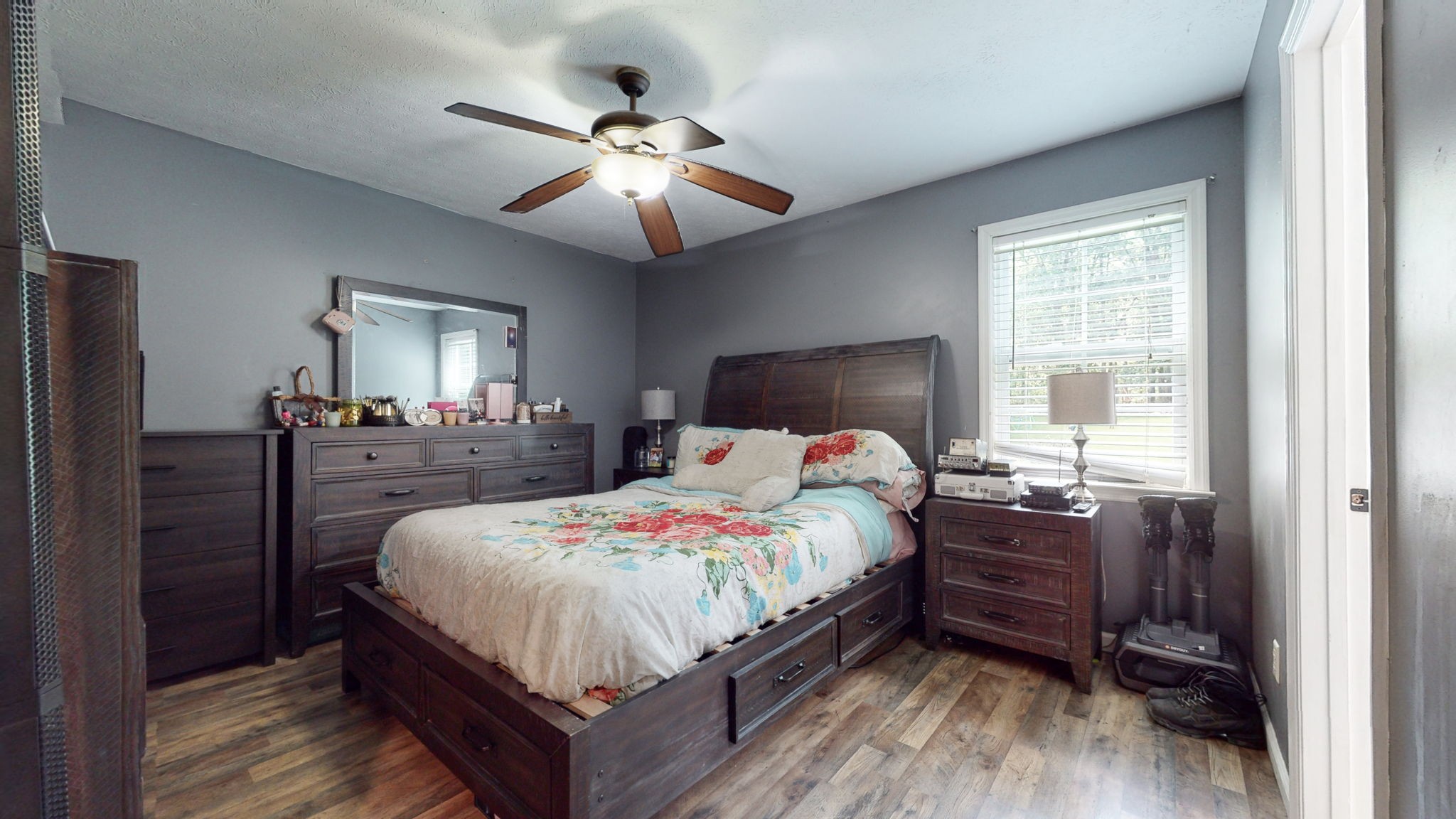 1014 Wildcat Road Dickson, TN 37055 - Photo 15 of 37 a bedroom with a bed and wooden floor