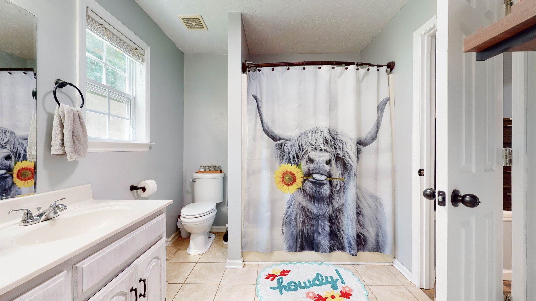 1014 Wildcat Road Dickson, TN 37055 - Photo 16 of 37 a bathroom with a sink toilet and shower