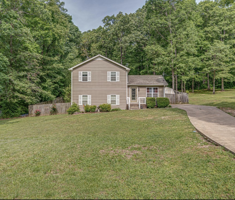 1014 Wildcat Road Dickson, TN 37055 - Photo 2 of 37 a front view of a house with a yard