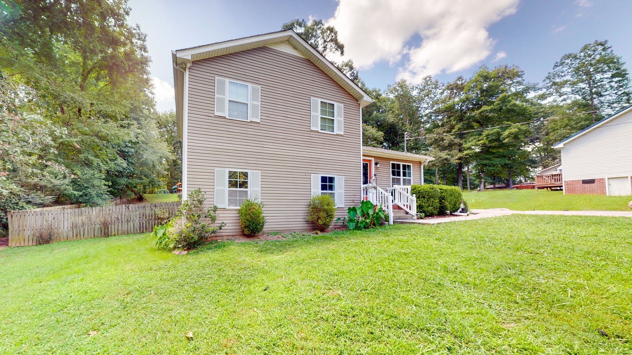 1014 Wildcat Road Dickson, TN 37055 - Photo 21 of 37 a view of a house with backyard and a tree