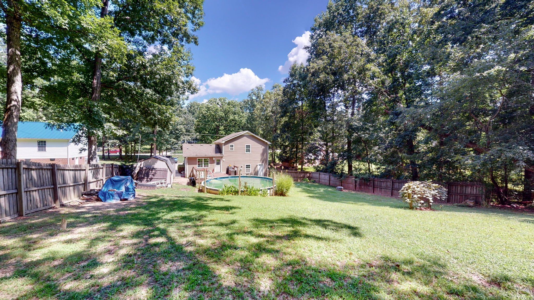 1014 Wildcat Road Dickson, TN 37055 - Photo 22 of 37 a view of a house with a yard and sitting area