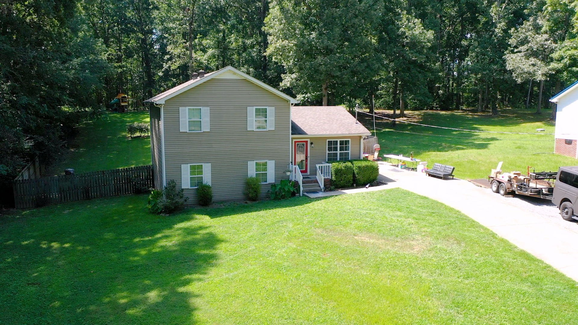 1014 Wildcat Road Dickson, TN 37055 - Photo 30 of 37 a front view of a house with garden