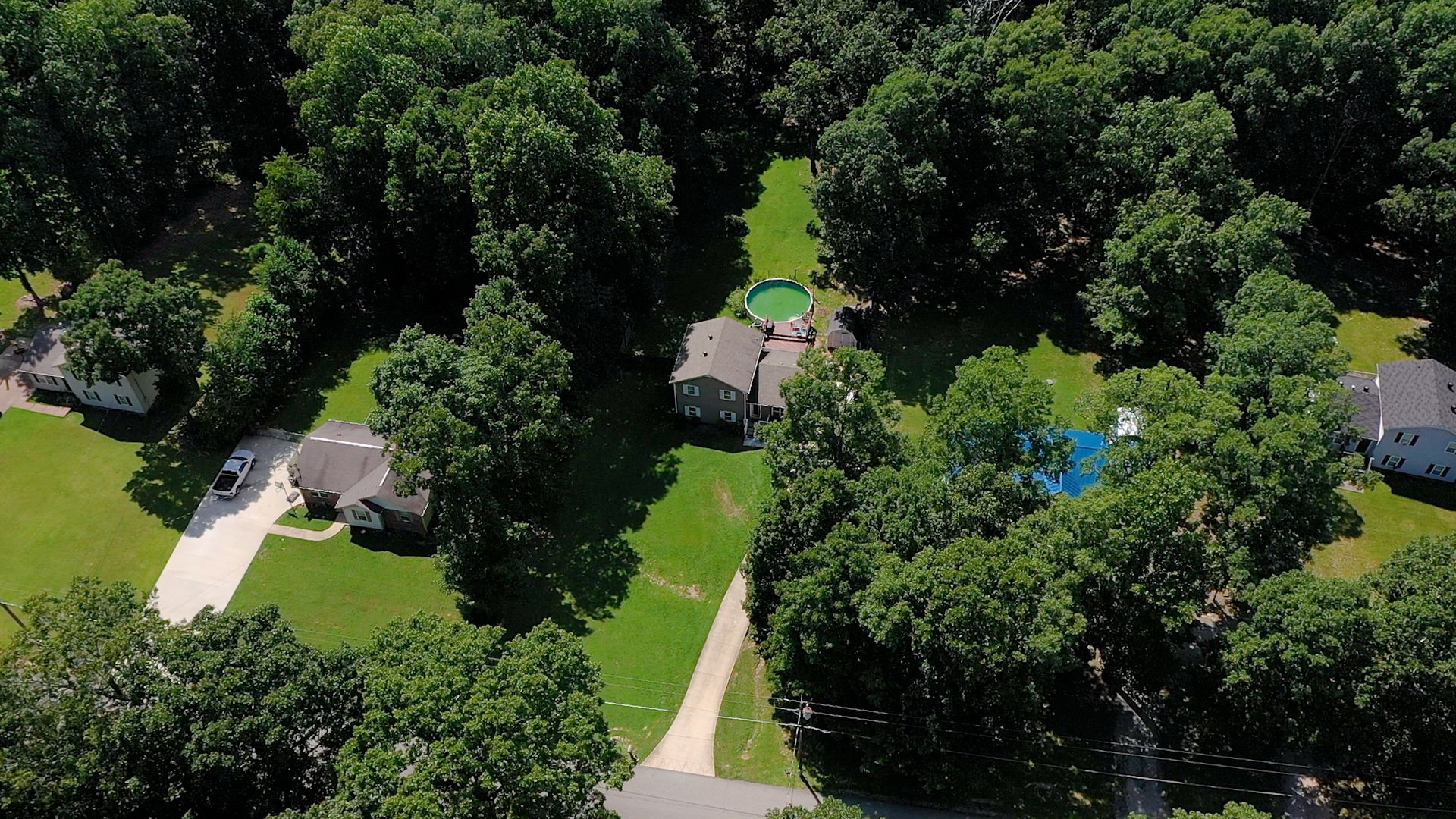 1014 Wildcat Road Dickson, TN 37055 - Photo 34 of 37 an aerial view of a house with a yard