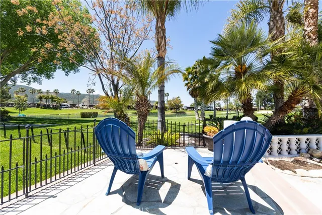 a view of a chairs and table in the yard