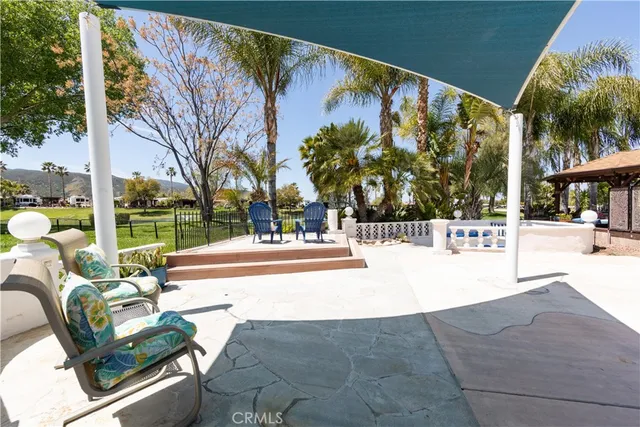 a view of outdoor space with garden and seating