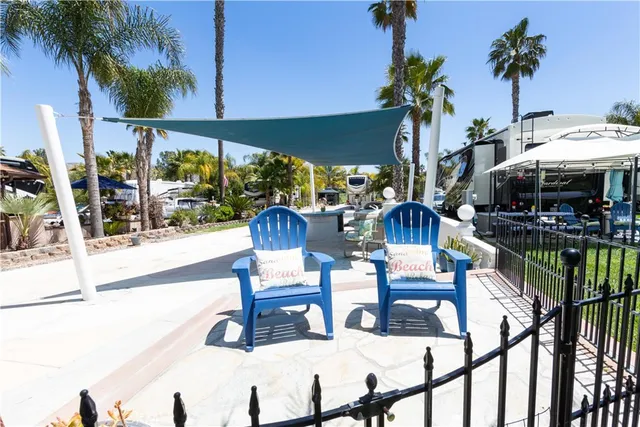 a view of swimming pool with outdoor seating