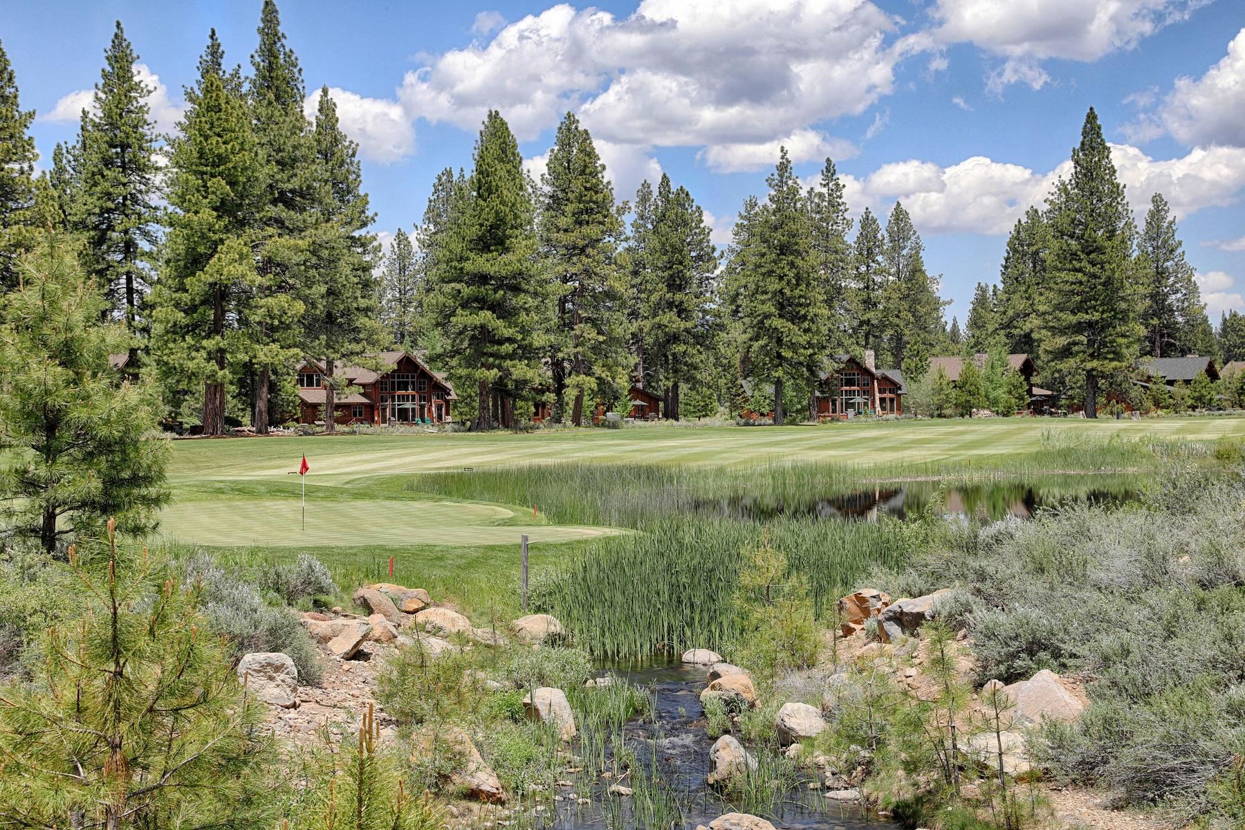 12283 Lookout Loop, Unit F834 Truckee, CA 96161 - Photo 9 of 26 a view of a golf course with a lake