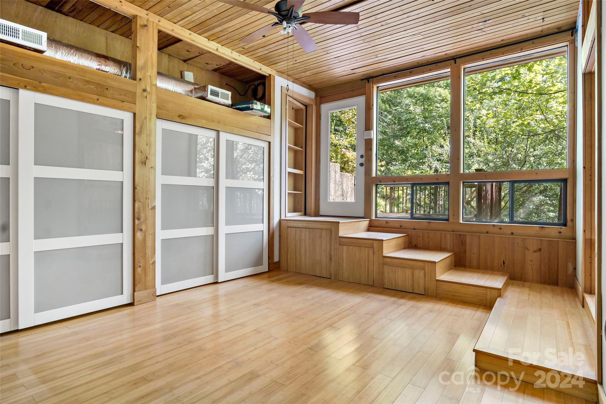 1265 Stackhouse Road Marshall, NC 28753 - Photo 17 of 34 a living room with furniture and windows