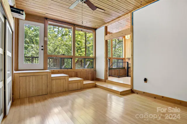 a bathroom with a granite countertop bathtub sink and toilet