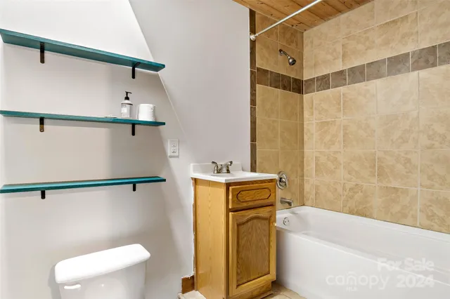 a view of a balcony with wooden floor