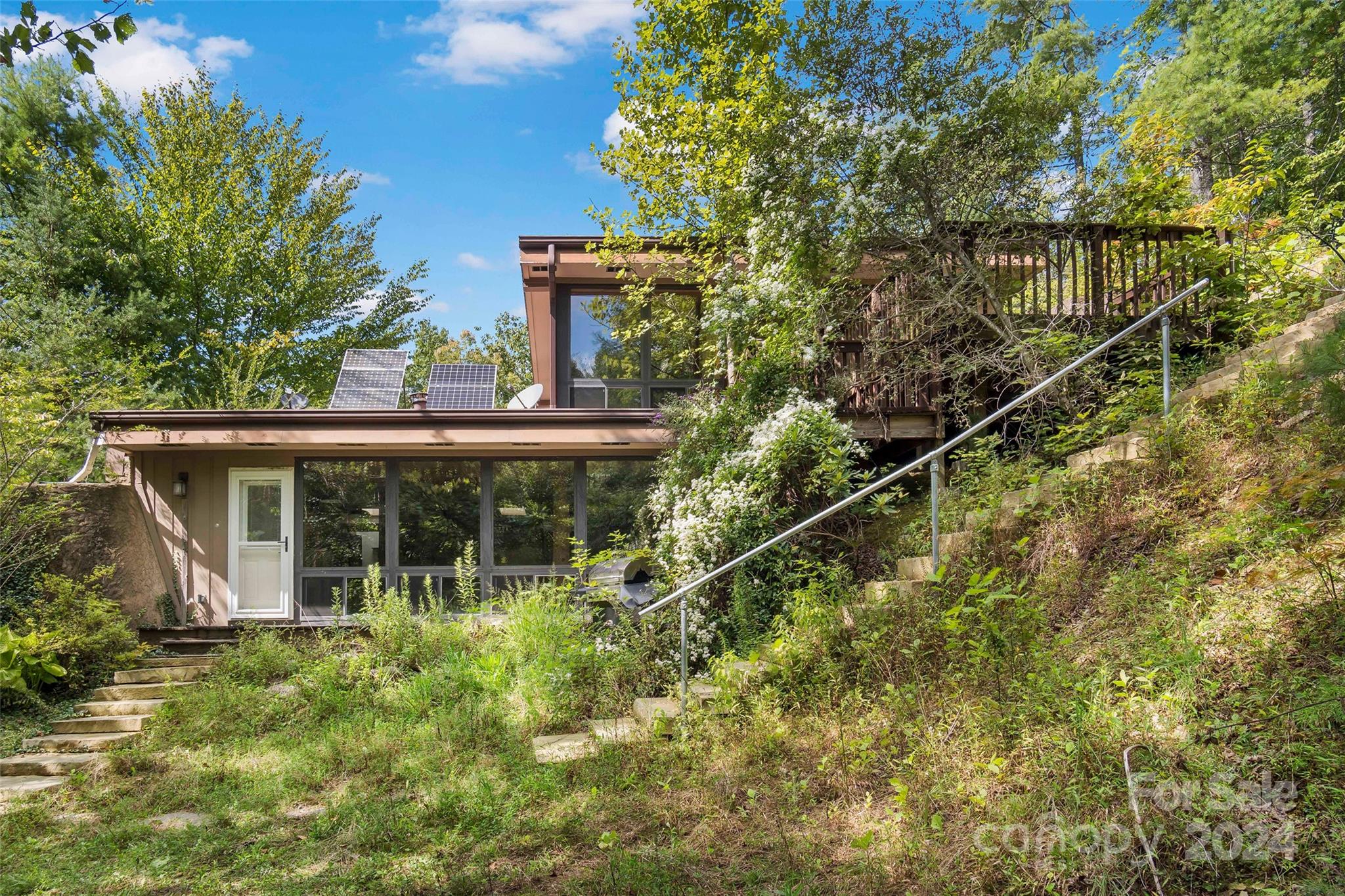 1265 Stackhouse Road Marshall, NC 28753 - Photo 29 of 34 a view of a house with a window