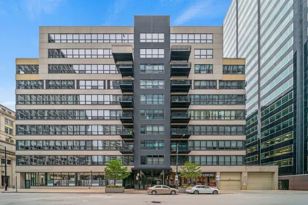 a front view of a building with a street