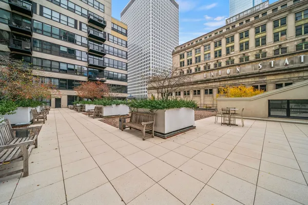 a view of a building with sitting area