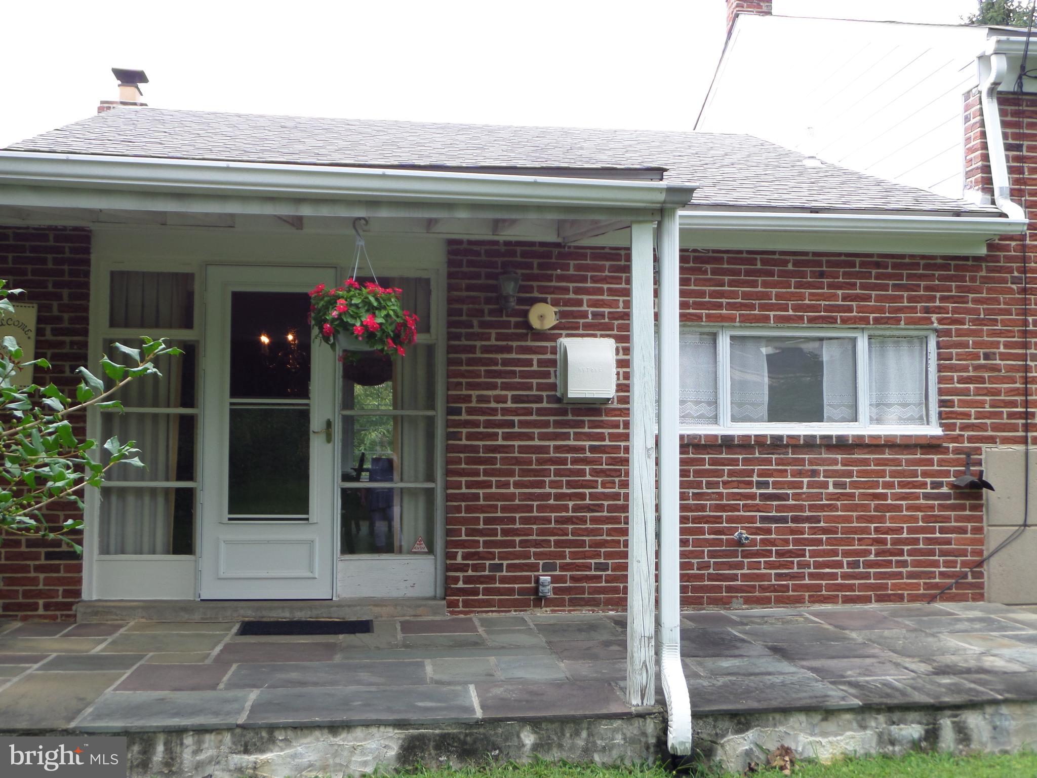 1449 Shoemaker Road Abington, PA 19001 - Photo 5 of 39 Sizable slate patio partially covered