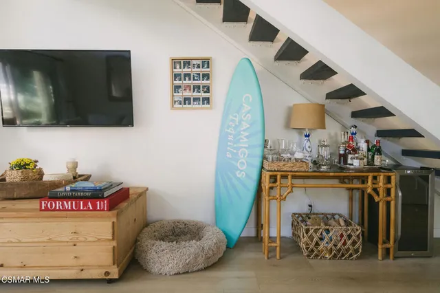 a bedroom with a bed and cabinets