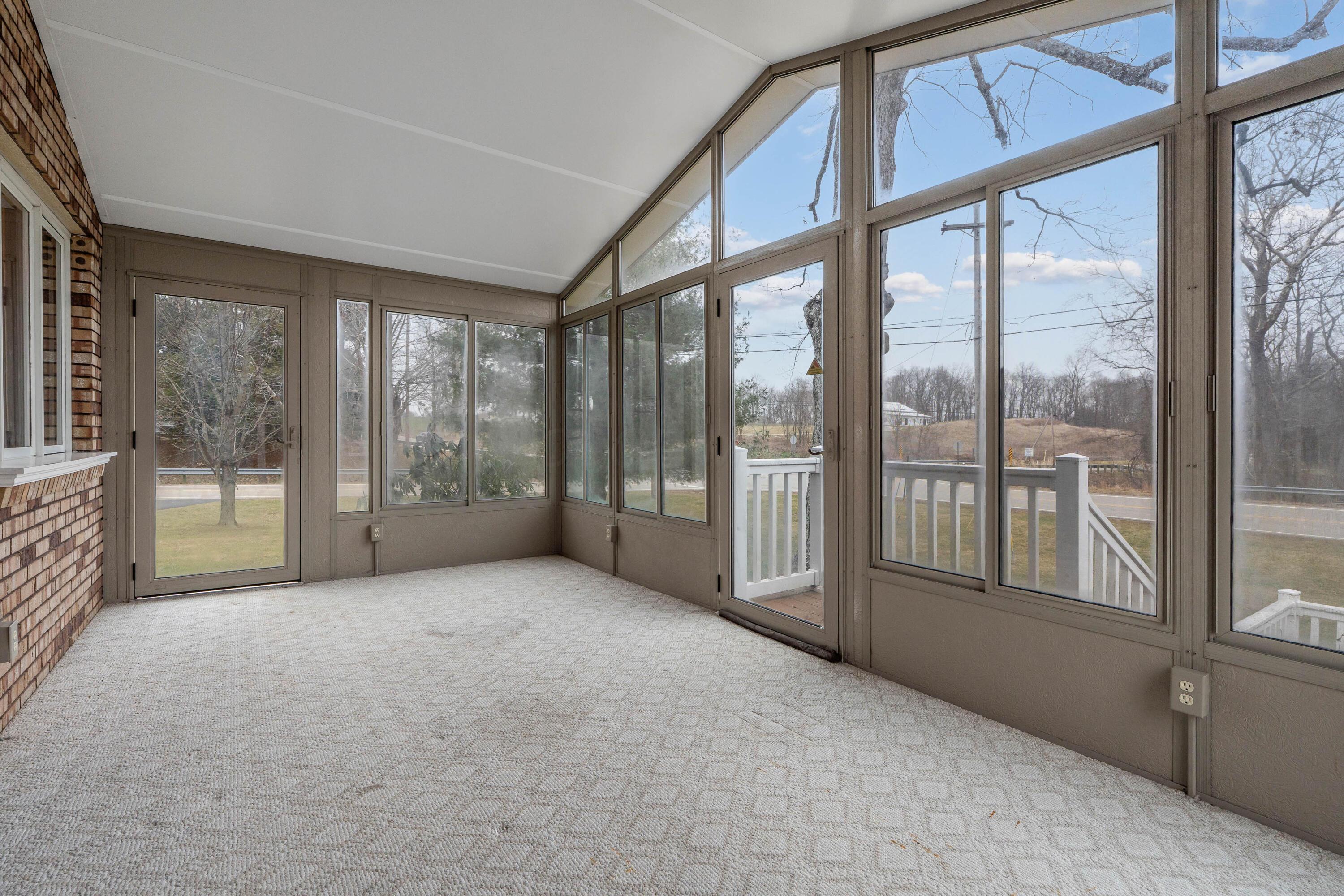 7173 Refugee Road Southwest Pataskala, OH 43062 - Photo 15 of 53 Four season room with walls of windows