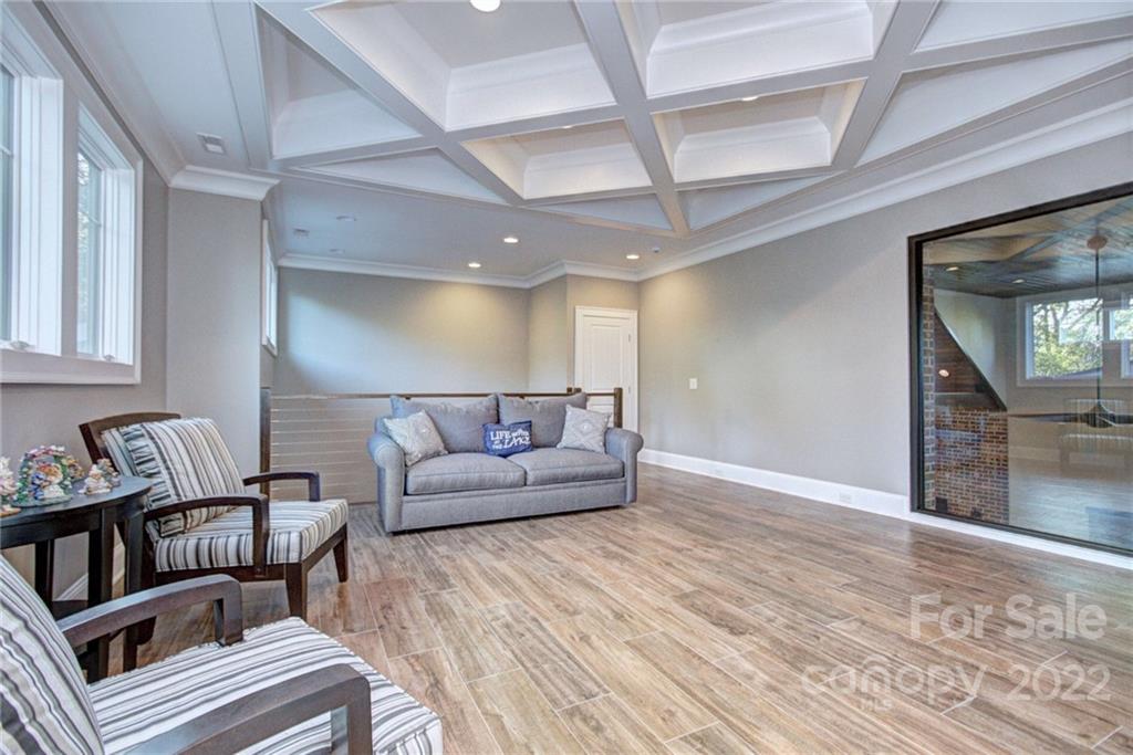 2188 Bessbrook Road Fort Mill, SC 29708 - Photo 29 of 48 a living room with furniture and a wooden floor