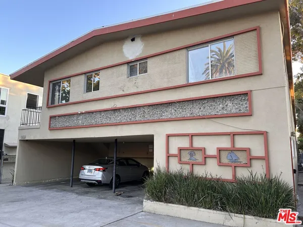 a car parked in front of a building