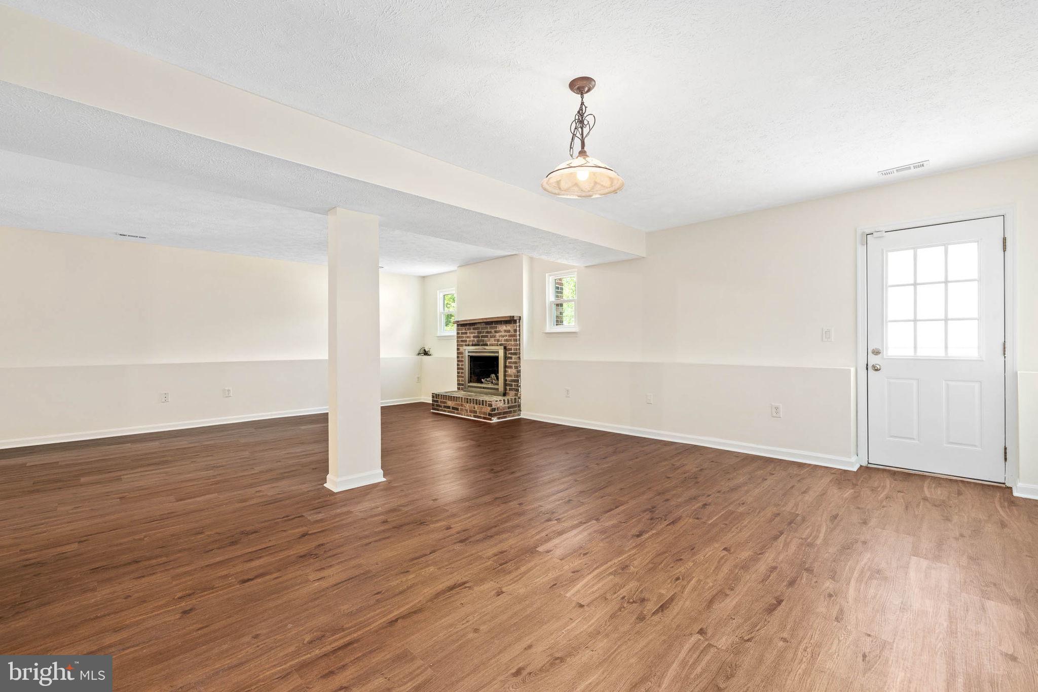 201 Choptank Road Stafford, VA 22556 - Photo 22 of 37 Cozy fireplace & access to backyard
