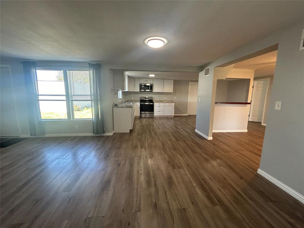 708 Barrow Street Goldthwaite, TX 76844 - Photo 4 of 20 2nd Living Room