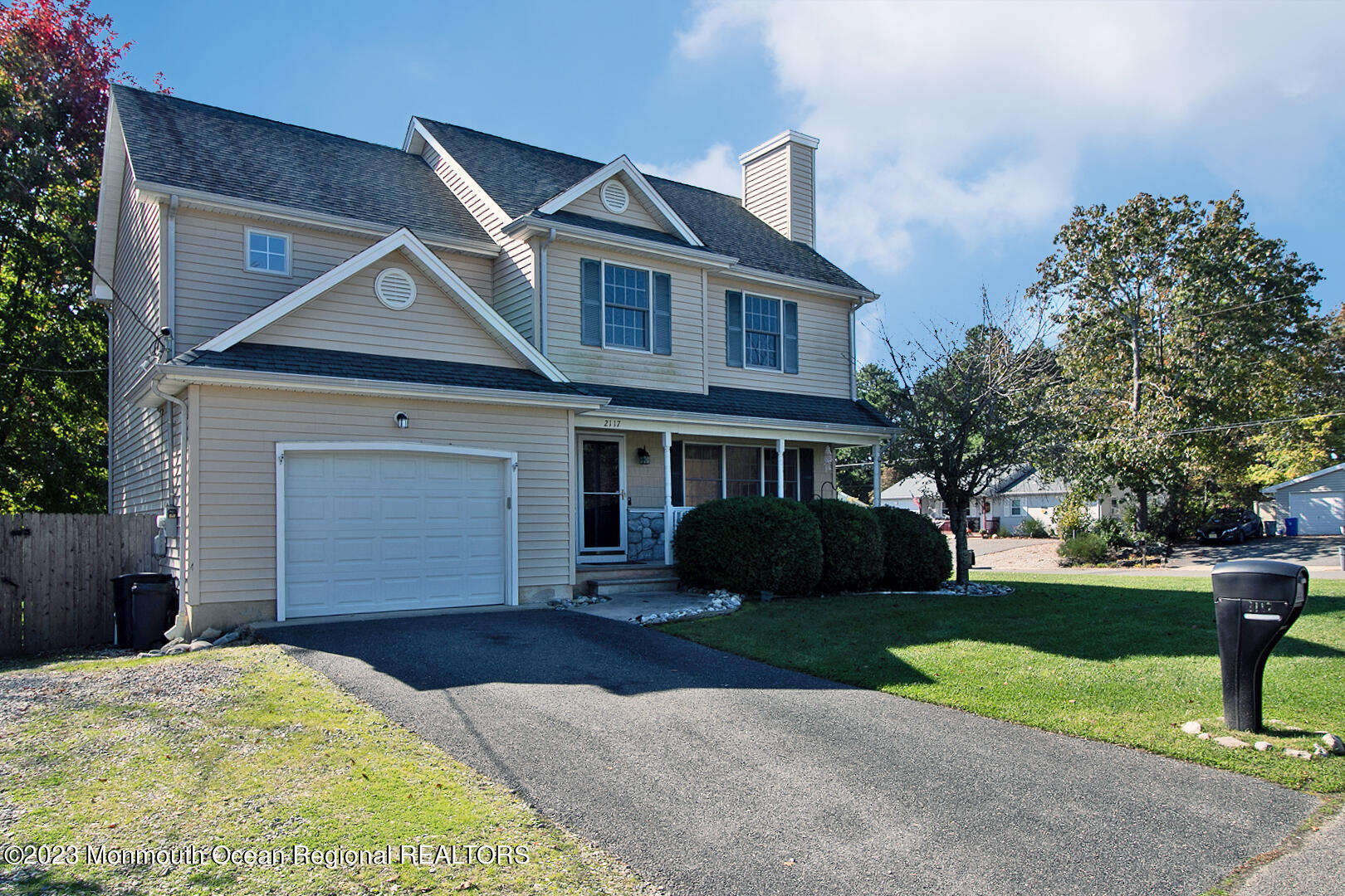 2117 Whitcomb Road Forked River, NJ 08731 - Photo 3 of 49 a front view of a house with a yard and garage