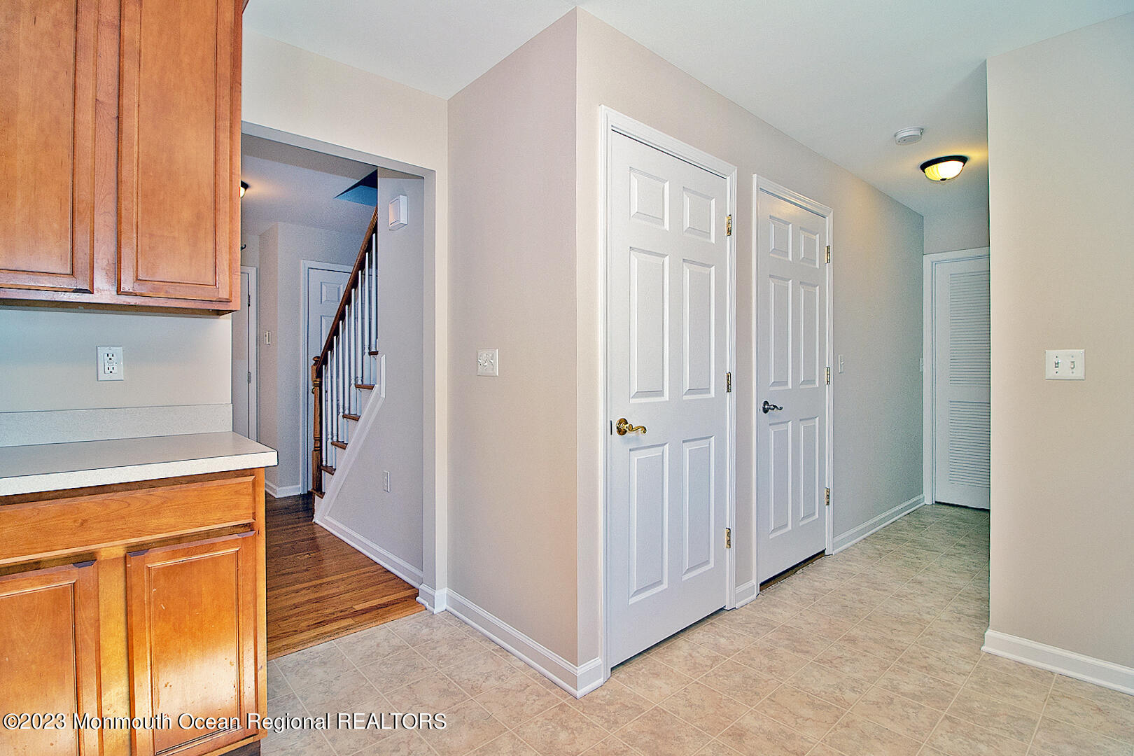 2117 Whitcomb Road Forked River, NJ 08731 - Photo 48 of 49 a view of a hallway with wooden floor and entryway