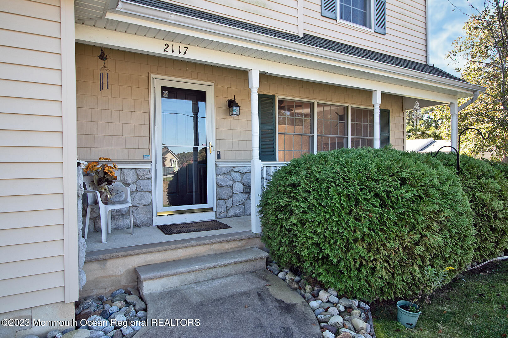 2117 Whitcomb Road Forked River, NJ 08731 - Photo 5 of 49 a front view of a house with potted plants