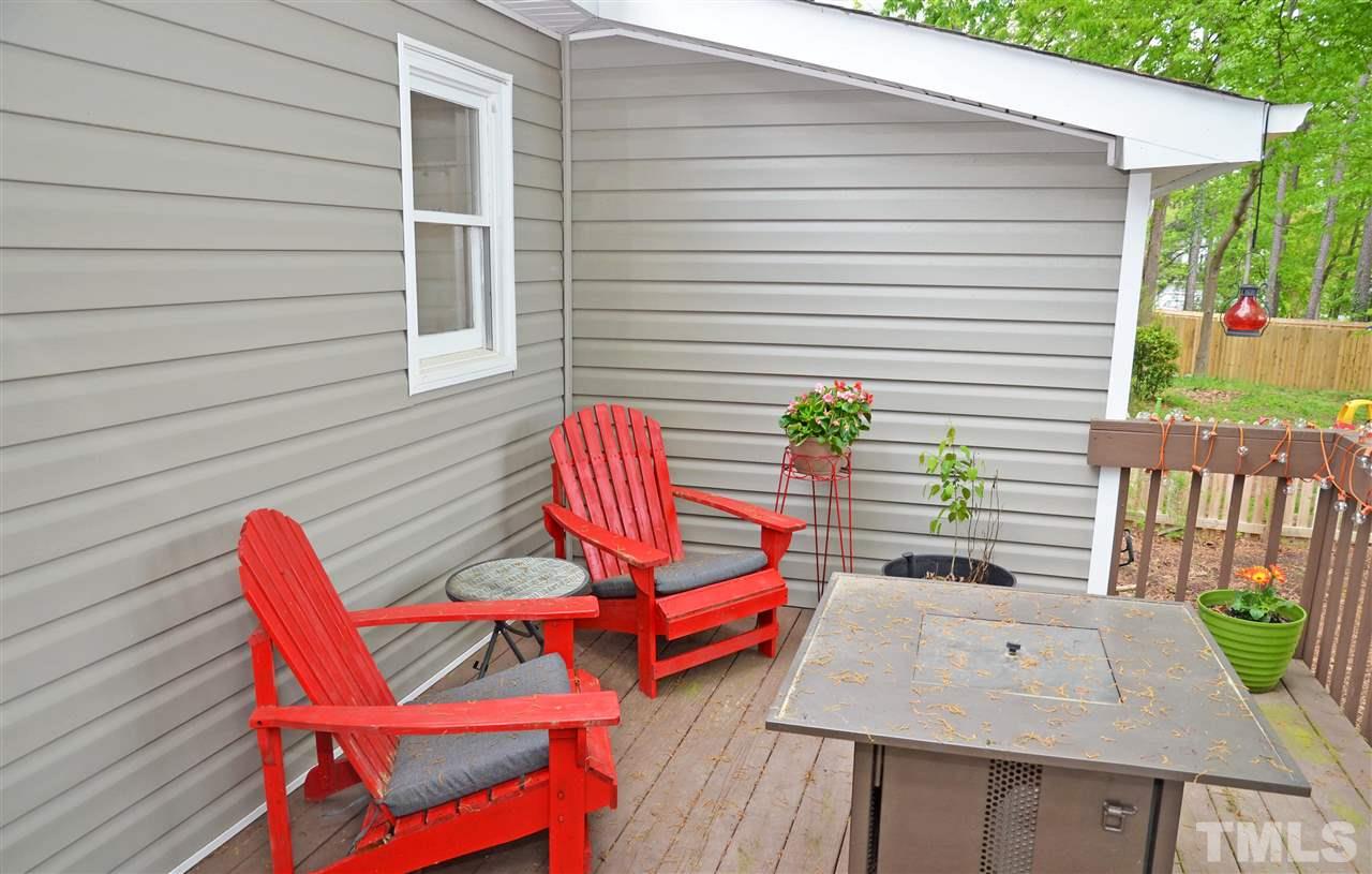 3913 Iron Horse Road Raleigh, NC 27616 - Photo 20 of 20 a view of a wooden chairs in patio