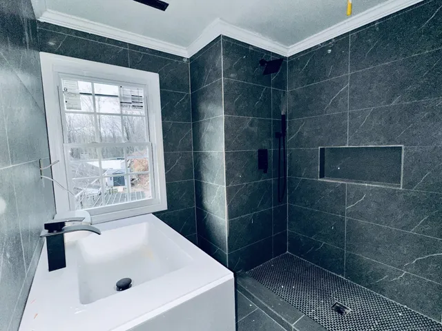 a bathroom with a bathtub