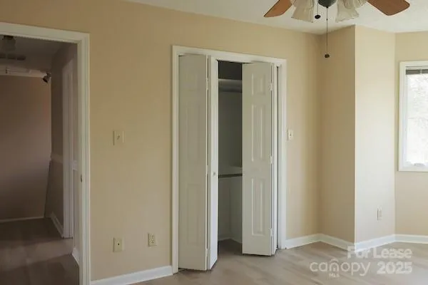 a view of a bedroom from a hallway