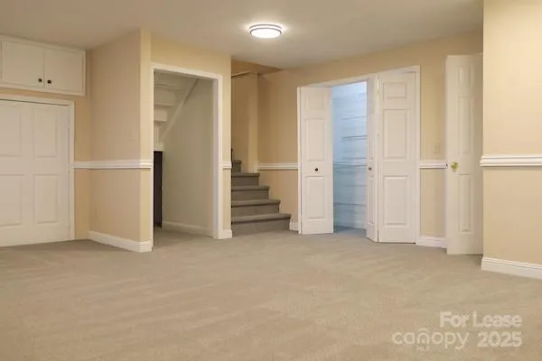 an empty room with closet area