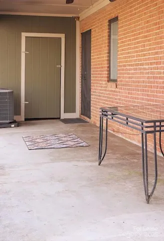 a view of an empty room and window
