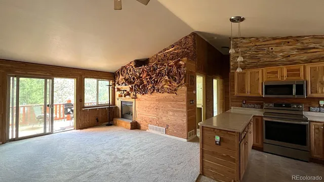 a bedroom with a bed and a television