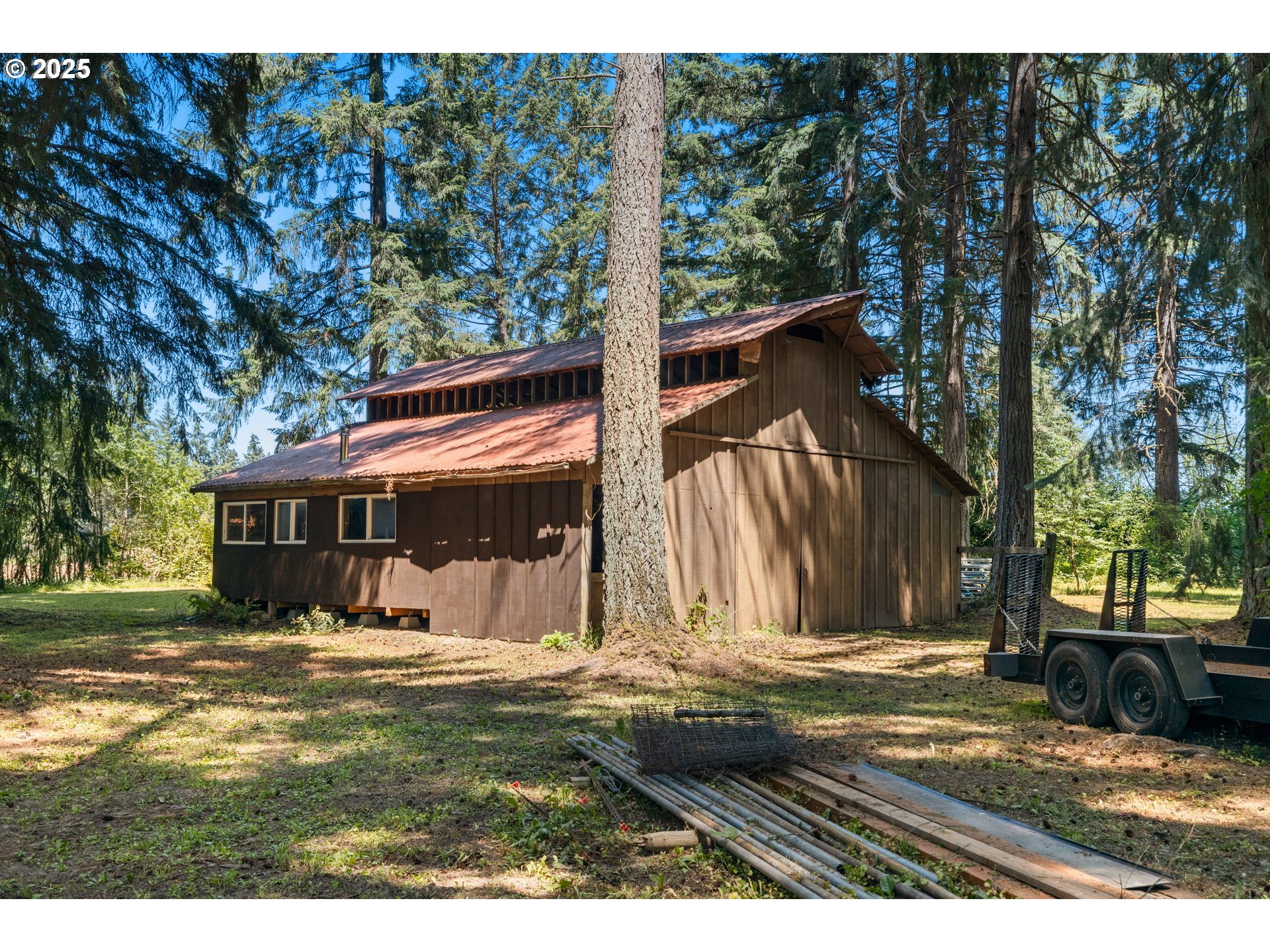 26465 Northwest West Union Road Hillsboro, OR 97124 - Photo 23 of 38 a view of a house with a yard