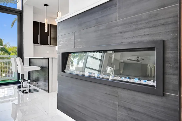 a bathroom with a shower and a sink