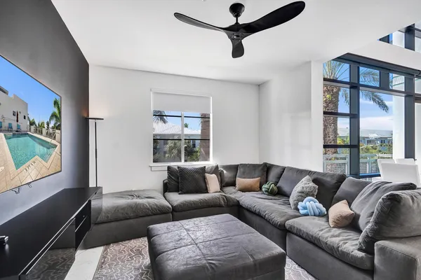 a living room with furniture and a window