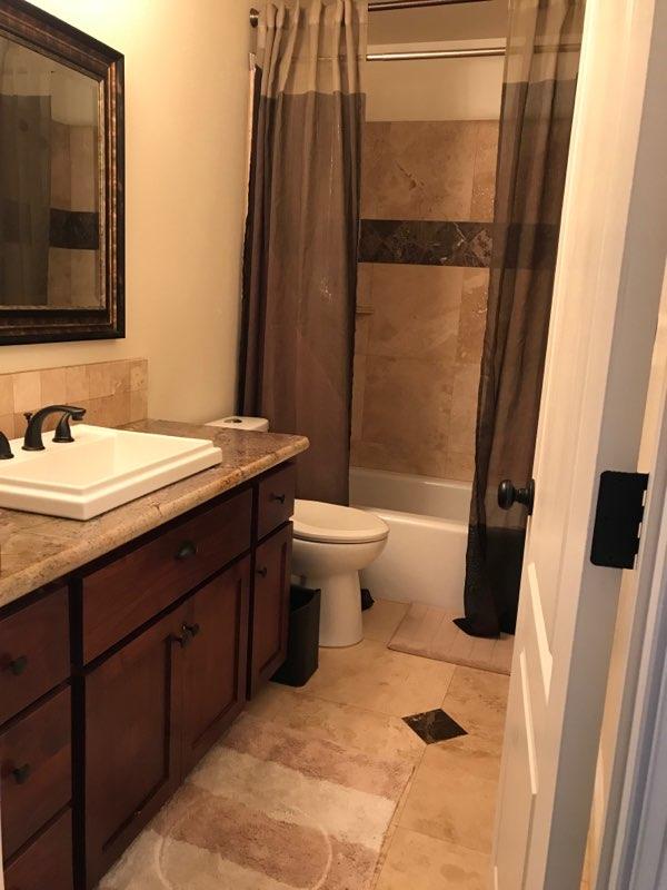 21710 Lone Tree Road Anderson, CA 96007 - Photo 11 of 16 a bathroom with a sink and a mirror