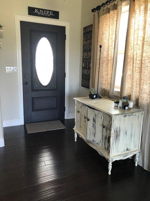 21710 Lone Tree Road Anderson, CA 96007 - Photo 3 of 16 a bathroom with a sink a mirror and wooden floor