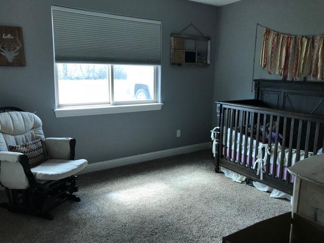 21710 Lone Tree Road Anderson, CA 96007 - Photo 8 of 16 a living room with furniture and a window